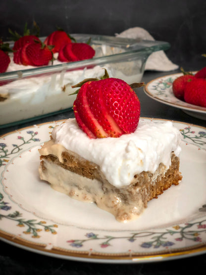Alkaline Vegan Tres Leches with a strawberry on top.